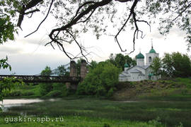 Ostrov. The сhurch of St. Nicholas (1542) and Suspension bridge (1853).